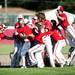 The Bedford team celebrates after a walk off hit to beat Saline on Monday, June 3. Daniel Brenner I AnnArbor.com